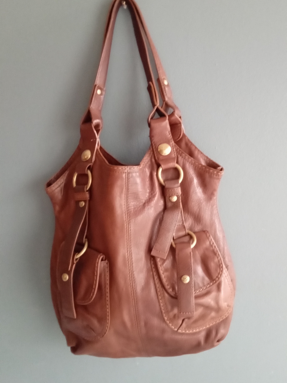Brown Leather Hobo Shoulder Bag with Front Pockets and Brass Hardware